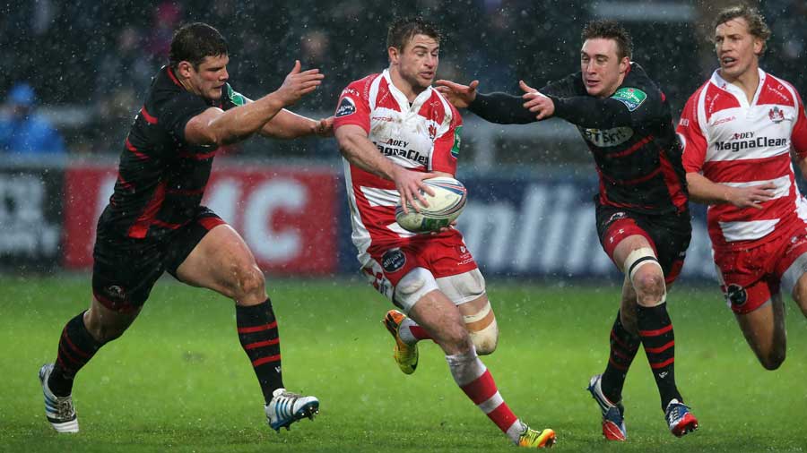 Gloucester's Henry Trinder looks to shift the ball on