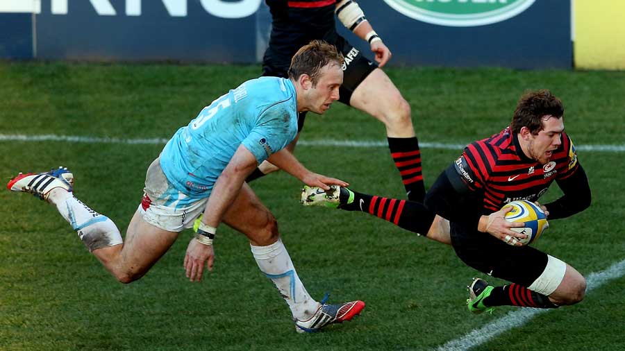 Saracens' Alex Goode glides over for a try