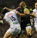 Harlequins' Mike Brown fights forward against Exeter