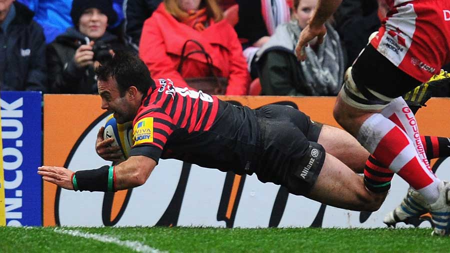 Saracens' Neil de Kock grabs the first try of the game