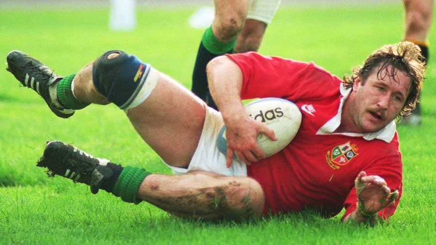 British Lions' Mike Teague crashes over