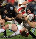 Ulster's Dan Tuohy struggles to keep hold of the ball against Montpellier