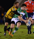 Adam Powell is tackled by Florin Surugiu
