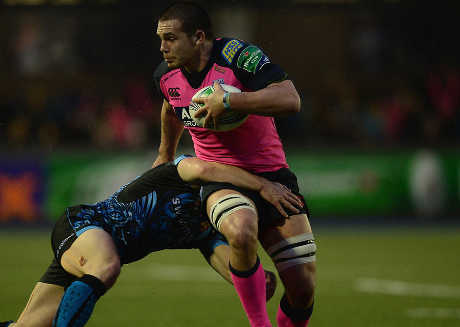 Ellis Jenkins tries to find a way past Exeter's Ben White