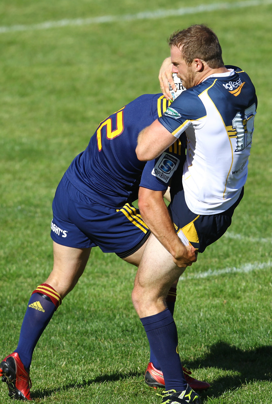 Pat McCabe gets tackled during Brumbies trial match,