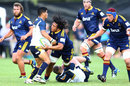 The Highlanders' TJ Ioane gets is tackled