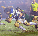 Bath's Dave Sisi is hauled to the ground