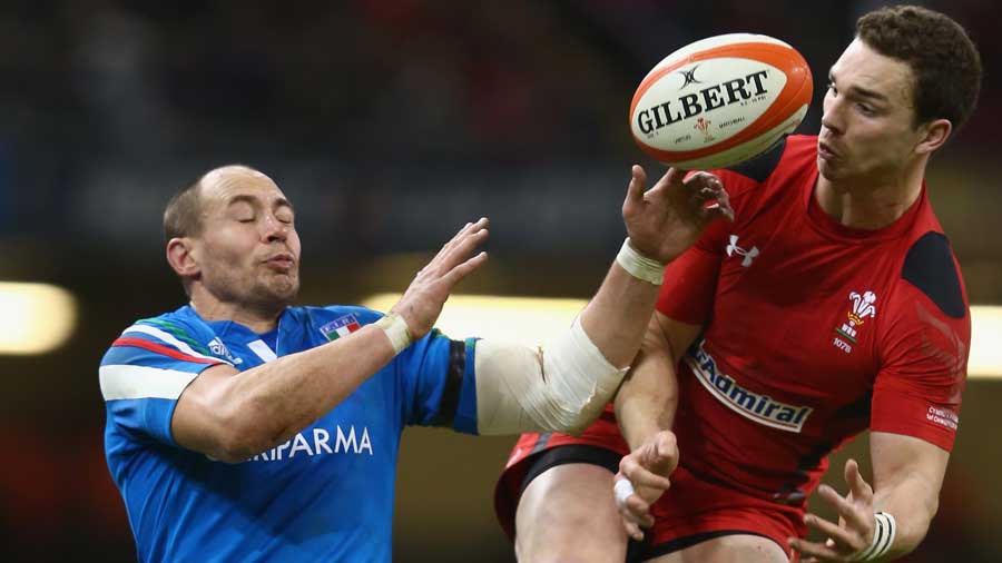 George North goes for the high ball alongside Sergio Parisse