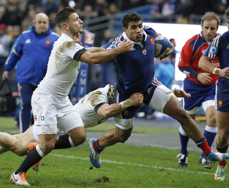 France's Wesley Fofana attempts to dance past Danny Care