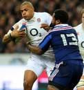 England's Luther Burrell goes toe-to-toe with Mathieu Bastareaud