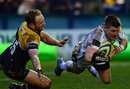 Exeter's Ceri Sweeney dives over to complete a resounding 42-3 win over Worcester