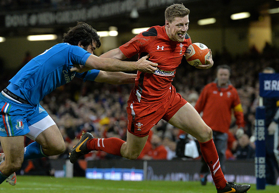 Rhys Priestland advances with the ball against Italy