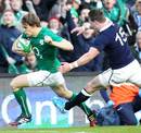 Ireland's Andrew Trimble darts over for the game's opening try
