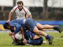 Stade Francais and Ulster vie for possession of the ball