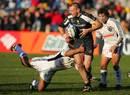 Worcester's Chris Latham is tackled by Petraca Padova's Nick Little