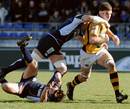 Wasps flanker Joe Worsley is shackled by the Castres defence
