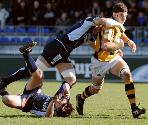 Wasps flanker Joe Worsley is shackled by the Castres defence