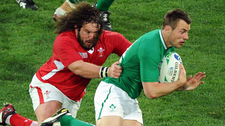 Wales' Adam Jones gets to grips with Tommy Bowe