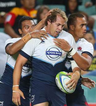 New South Wales' Stephen Hoiles is congratulated after scoring, New South Wales Waratahs v Blues, Super Rugby trial match, Allianz Stadium, Sydney, February 7, 2014