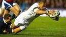 England's Luther Burrell gets the try