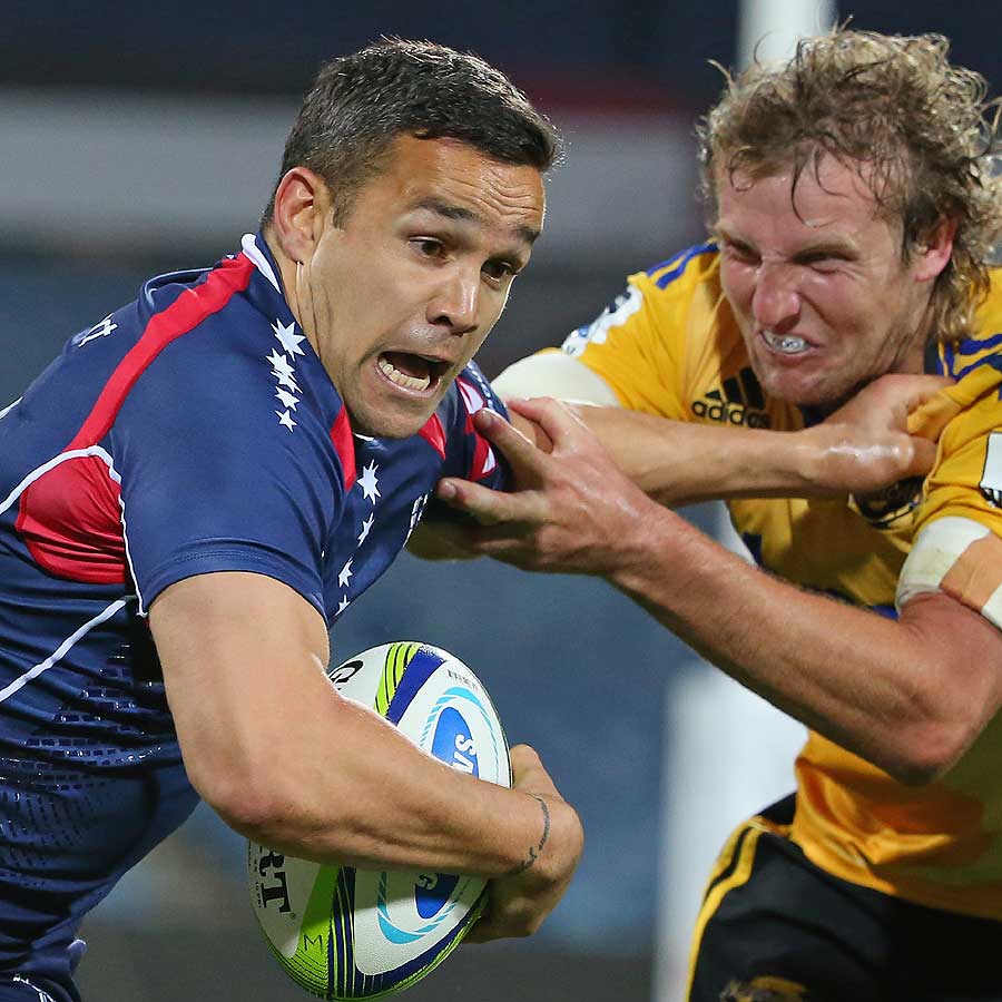 Melbourne's Tamati Ellison is tackled by Hadleigh Parkes