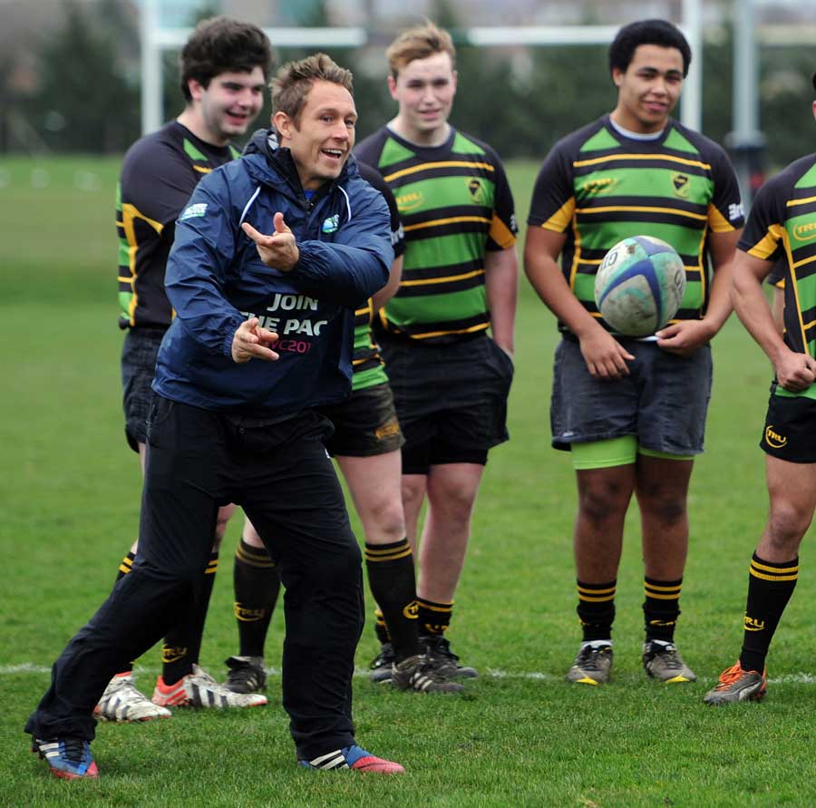 Jonny Wilkinson wings a pass out while launching the  Rugby World Cup 2015 Volunteer Programme