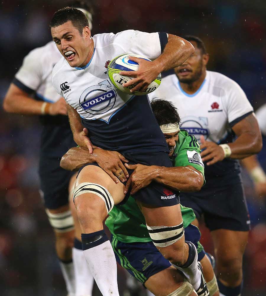 Dave Dennis of the Waratahs charges ahead