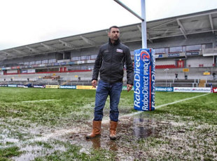 A groundsman inspects the pitch at Ravenhill, Ulster v Scarlets, Ravenhill, February 14, 2014