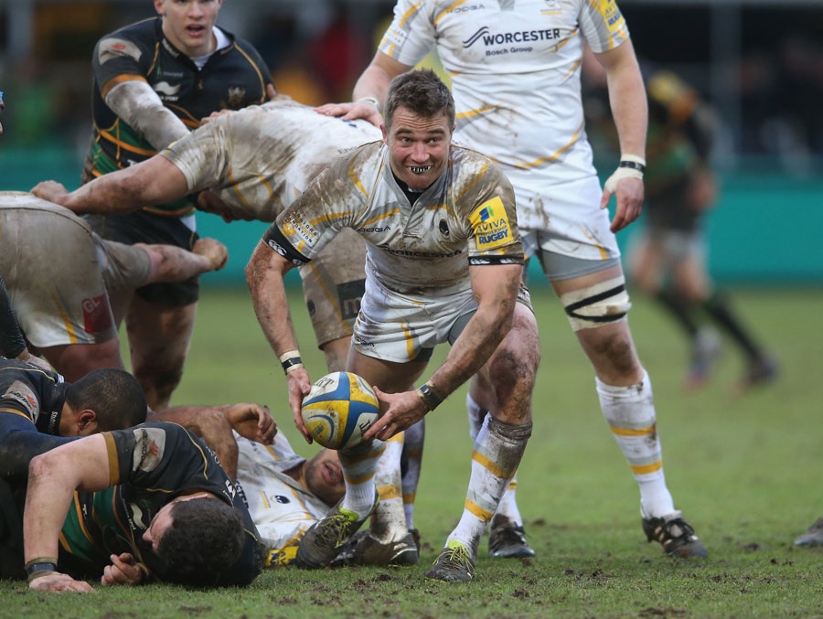 A muddied Alex Grove of Worcester passes out from a ruck