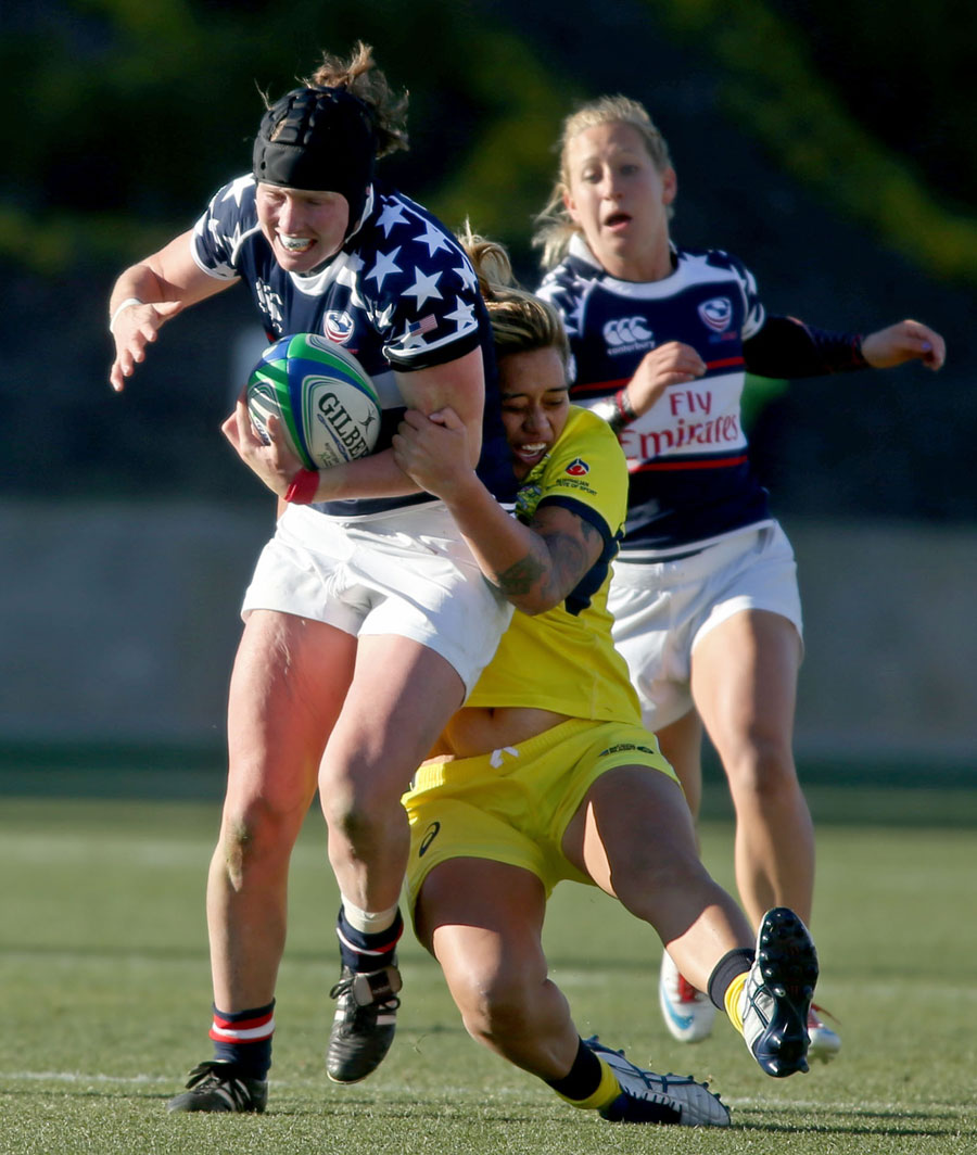 United States' Jillion Potter is tackled by Australia's Hanna Sio
