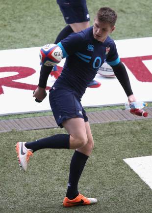 England's Owen Farrell juggles a ball ahead of the captain's run, February 21, 2014
