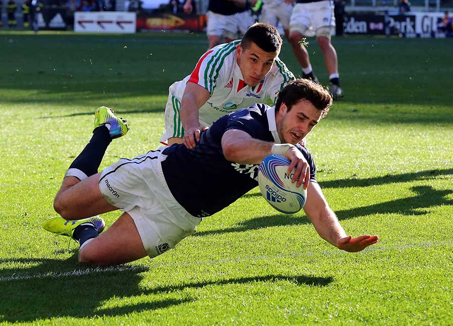 Alex Dunbar scores the first of his two tries against Italy