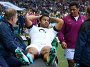 Mako Vunipola checks on his brother Billy after he hobbled off the field