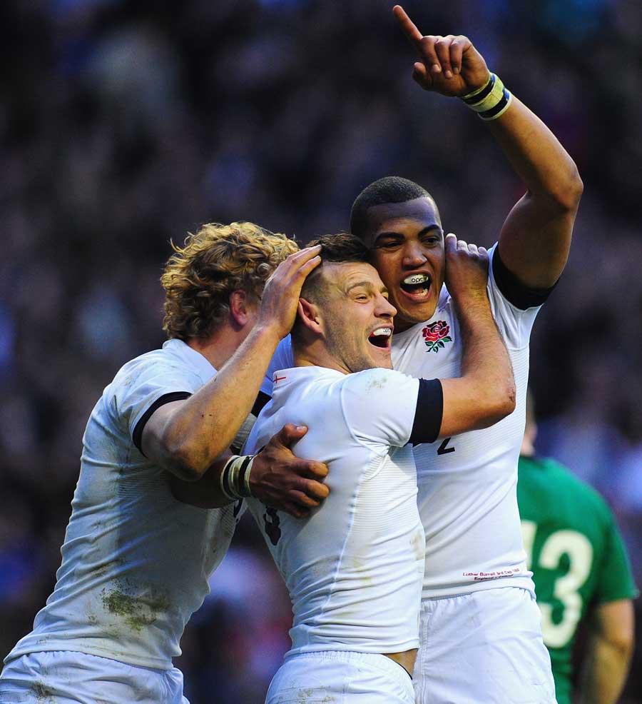 England celebrate Danny Care's try