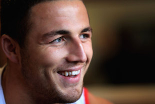 A smiling Sam Burgess chats to reporters, London, November 23, 2013