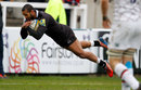 Noah Cato takes flight as he scores Newcastle's opening try