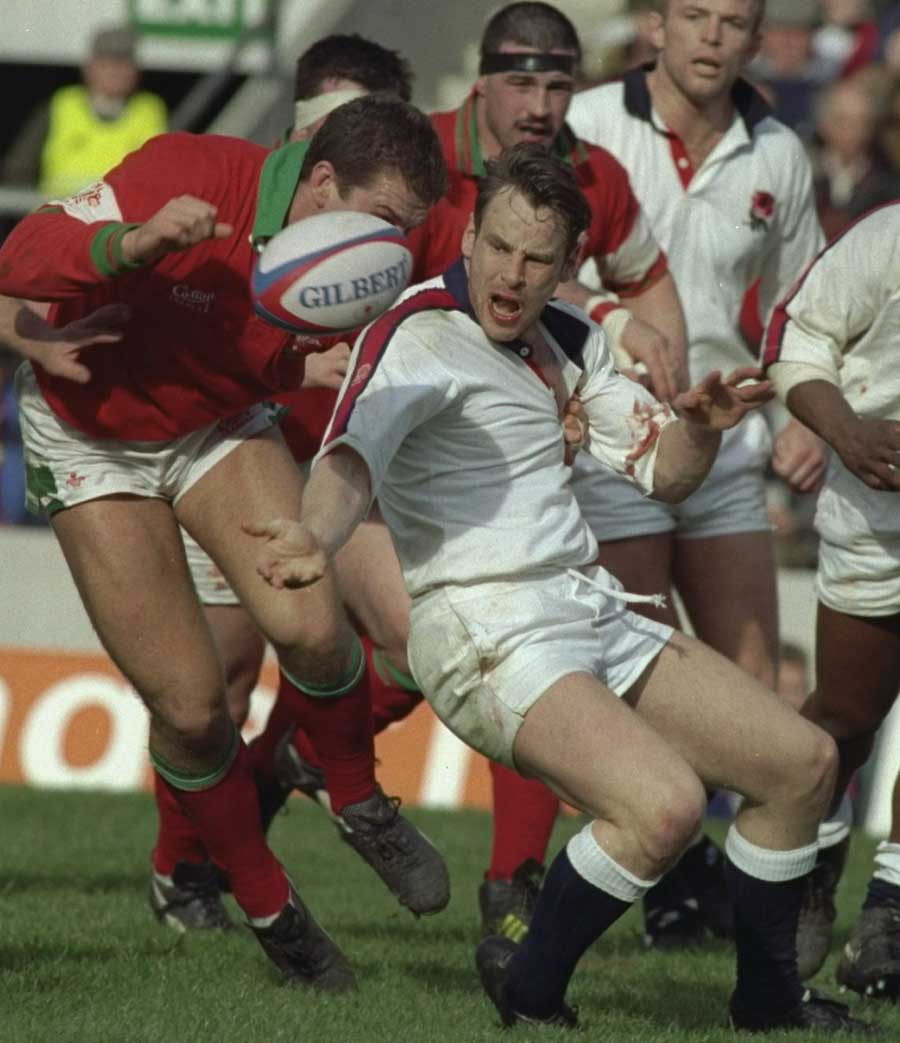 England's Ian Hunter is felled by the Wales defence