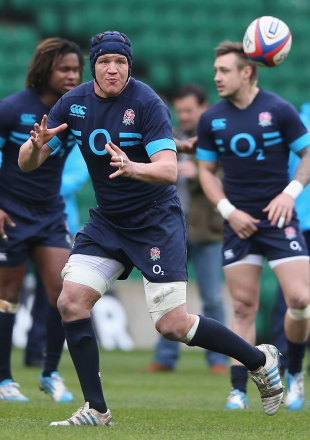 Tom Johnson  passes the ball during an England training session,  Twickenham, March 5, 2014