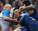 Scotland's Matt Scott finds it hard going against France