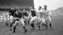 Scotland's Norman Bruce is pursued by England's Ron Jacobs