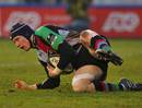Harlequins' Jim Evans touches down for a try
