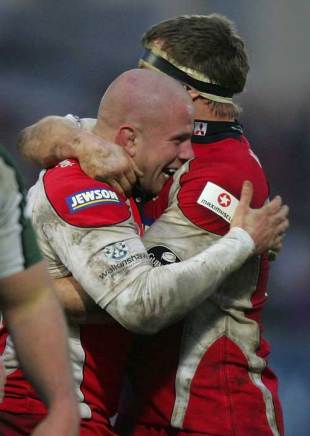 Gloucester's Nick Wood and Greg Somerville celebrate victory over London Irish