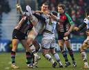 Northampton's Mark Easter is wrapped up by the Harlequins defence
