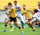 Beauden Barrett beats the tackle of Willie le Roux