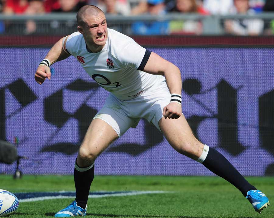 England's Mike Brown celebrates scoring the opening try of the game