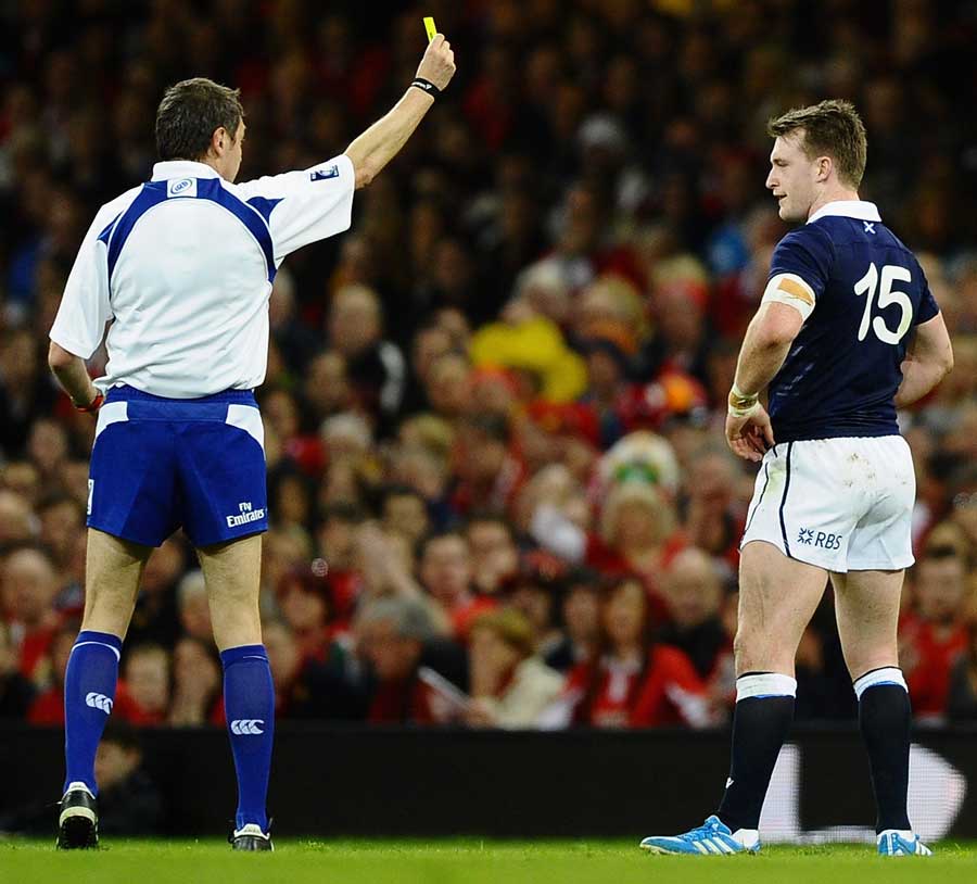 Scotland's Stuart Hogg is shown a yellow card ... moments later this was switched to red