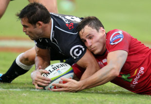 The Reds' Mike Harris and the Sharks' Cobus Reinach tussle for the ball, Sharks v Reds, Super Rugby, Kings Park, Durban, March 15, 2014