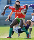 Portugal's Aderito Esteves is tackled by Scotland's Andrew Turnbull 