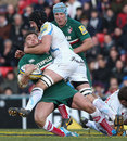 Owen Williams is high tackled by Dean Mumm who received a yellow card