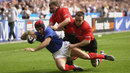 Vincent Clerc of France dives over to score
